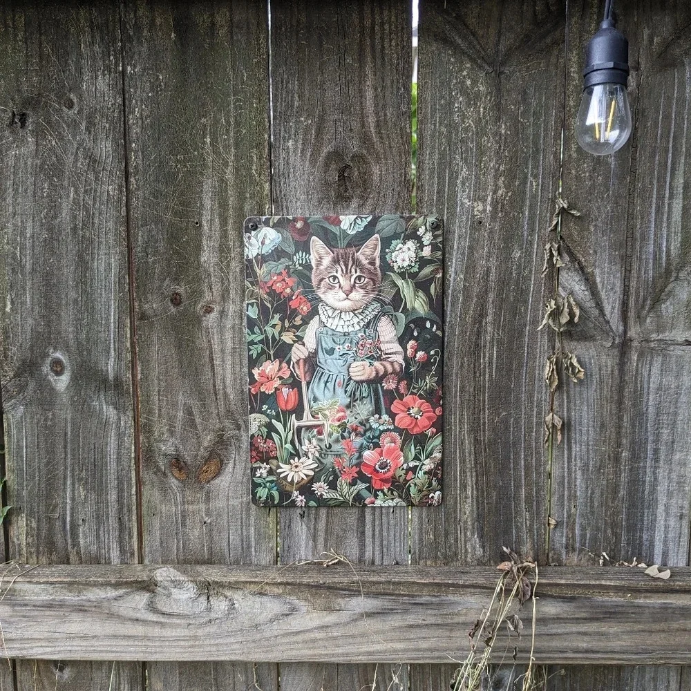 Female cat gardening, red flowers metal tin garden sign